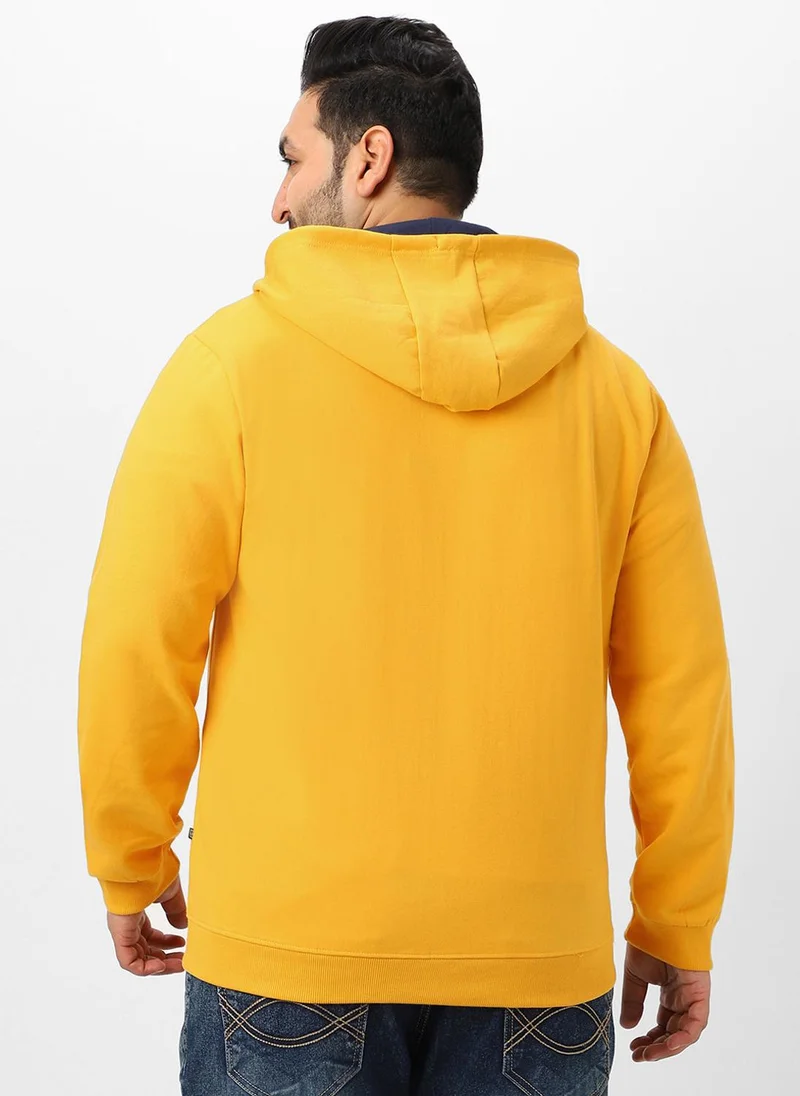 Urbano Fashion  Urbano Plus Men's Yellow Solid Cotton Zippered Hooded Casual Winterwear Sweatshirt for Men | Best Price UAE